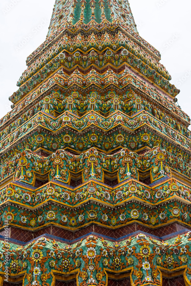 Close up of intricate art detailed of stupa in Wat Pho temple, Bangkok, Thailand.