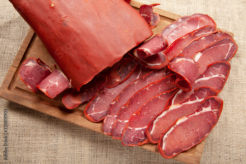 Turkish bacon, pastrami ( kayseri pastirma ) Fresh sliced pastrami photo