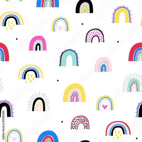 Baby seamless pattern with cute rainbow . Creative vector background for fabric, textile, nursery wallpaper.