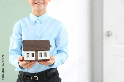 Little real estate agent wi...