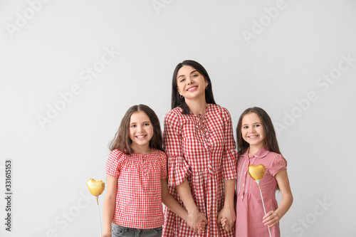 Woman and her little daught...
