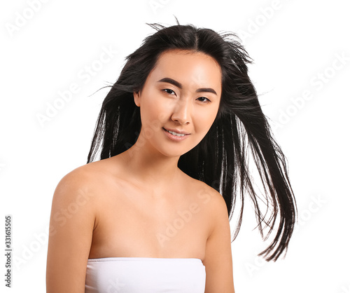 Young Asian woman with beau...