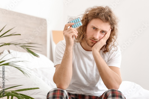 Sad man with oral erectile ...