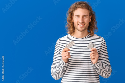 Young man with oral erectil...