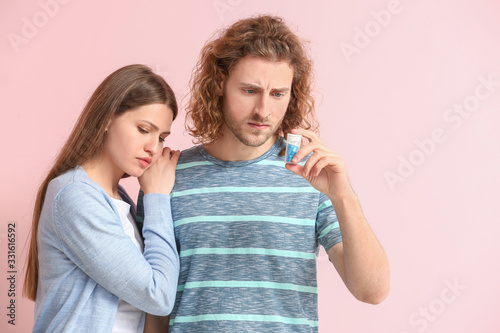 Sad young couple with oral ...