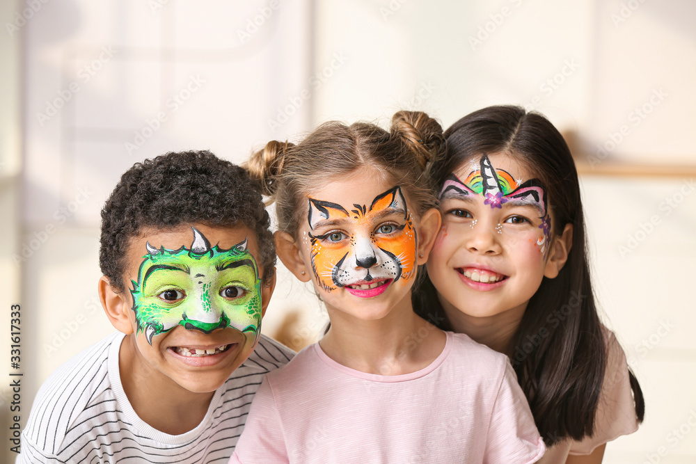 Funny little children with face painting at home Stock Photo | Adobe Stock