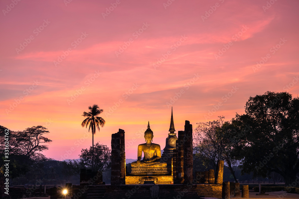 Fototapeta premium Buddha Statue at Wat Mahathat in Sukhothai Historical Park. UNESCO World Heritage, Thailand