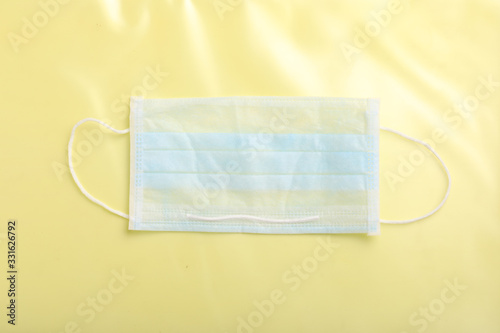 Medical mask for protection against flu and corona virus on white background