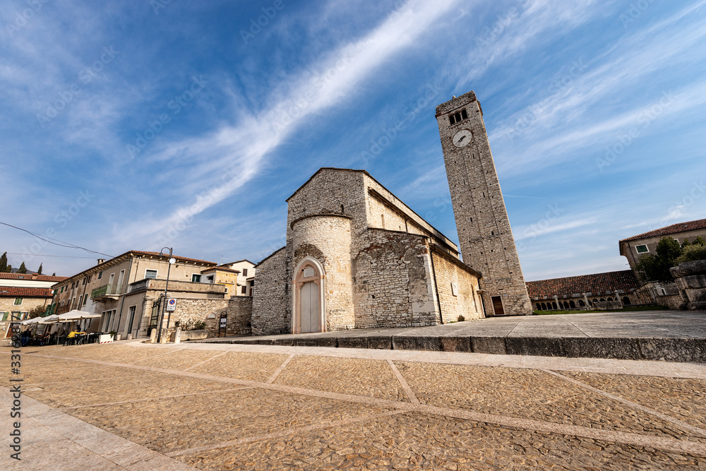 Facade of the ancient parish Church of San Giorgio di Valpolicella or Ingannapoltron in Romanesque style (VII - XI century). Verona province, Veneto, Italy, Europe