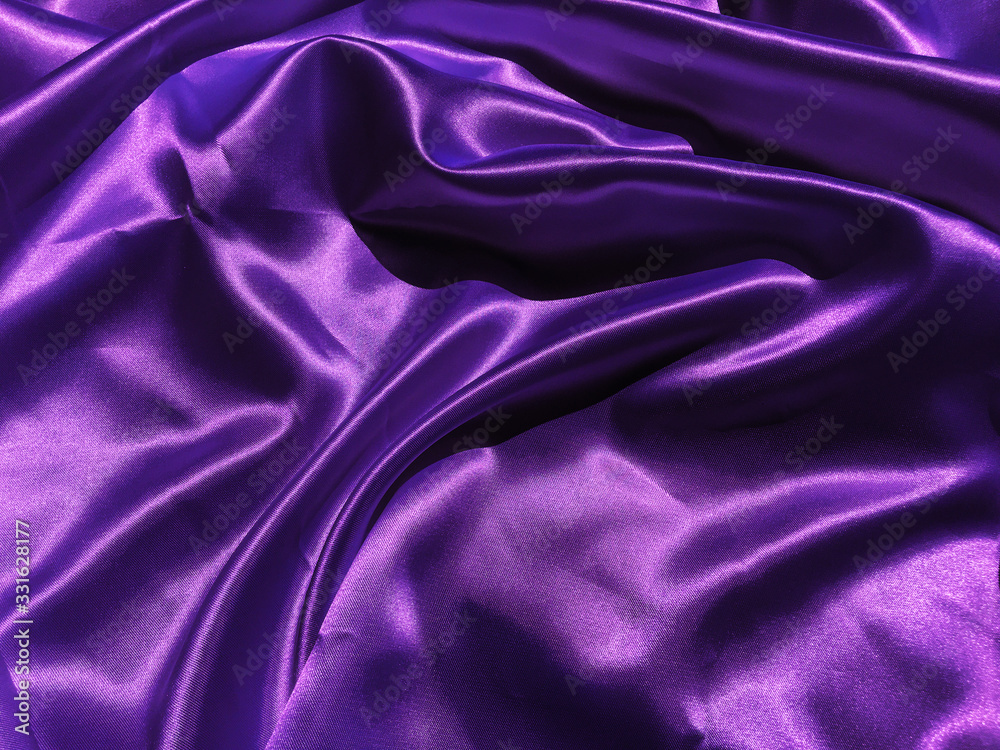 Pattern of purple fabric texture background. wavy folds of grunge silk texture satin velvet material for design Pattern of purple fabric texture background. wavy folds of grunge silk texture satin velvet material for design