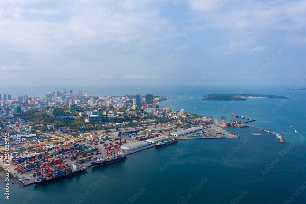 Sihanoukville, Cambodia - March 15, 2020: Ariel view of container terminal of Sihanoukville Autonomous Port. Sihanoukville, Cambodia - March 15, 2020: Ariel view of container terminal of Sihanoukville Autonomous Port.