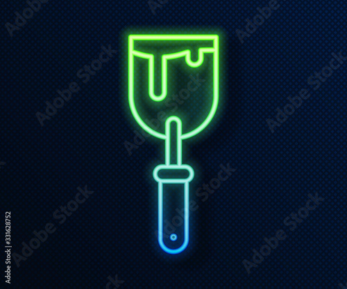 Glowing neon line Putty knife icon isolated on blue background. Spatula repair tool. Spackling or paint instruments. Vector Illustration