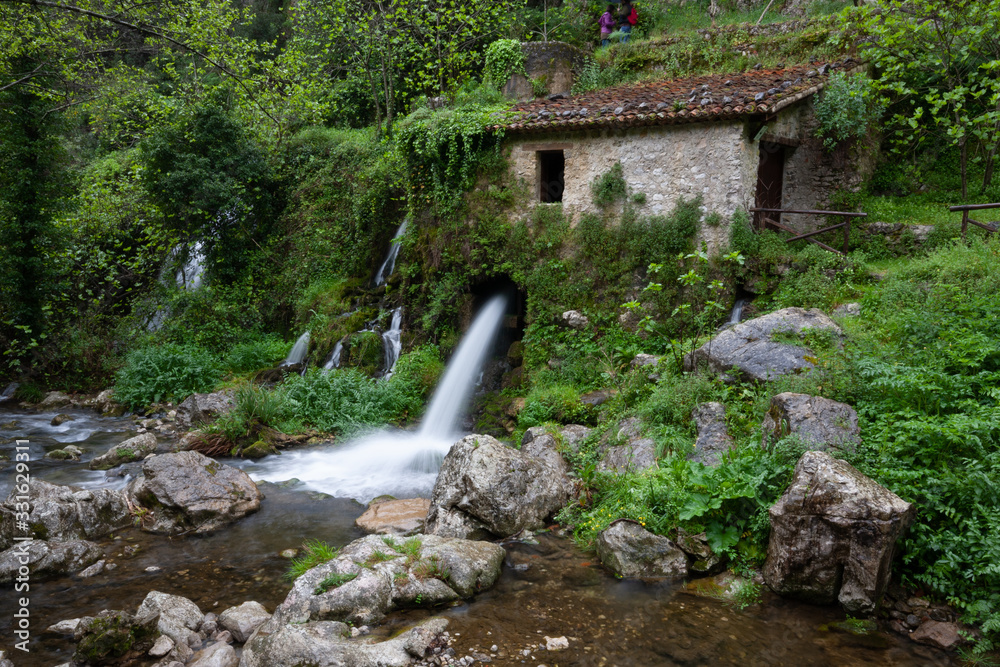 The ancient water mill in the natural reserve of Morigerati, by Bussento river in Cilento National Park, Salerno, Campania, Italy
