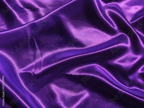 Beautiful smooth purple fabric texture background with copy space for design