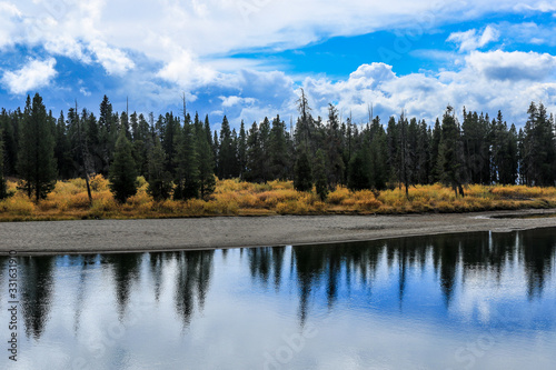 Majestic Landscape of the Trees and Lake in Yellowstone National Park, USA © Dave