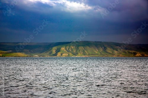 Quadro su tela Kinneret Lake or Galilee sea in Tiberius overlooking the Golan Heights on a background of a stormy sky, Israel, Middle East