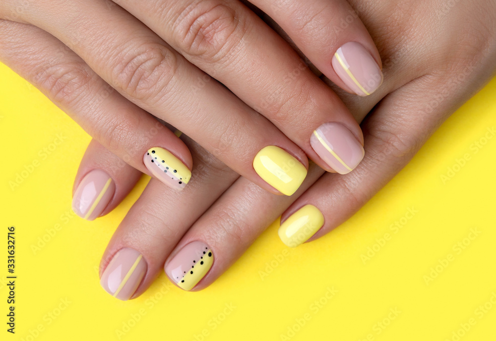 Woman's hands with spring summer nail design Woman's hands with spring summer nail design