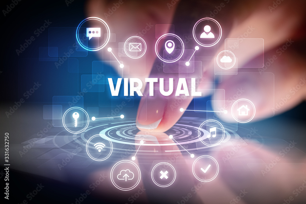 Finger touching tablet with web technology icons and VIRTUAL inscription, web technology concept Finger touching tablet with web technology icons and VIRTUAL inscription, web technology concept