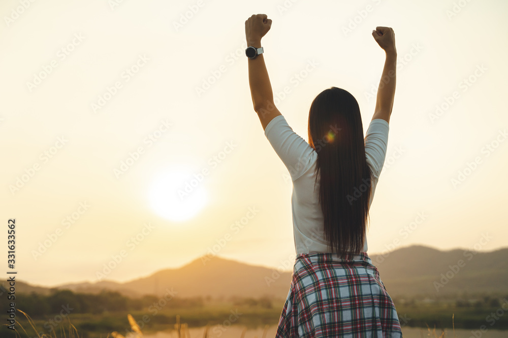 silhouette happy success woman rising hands on mountain silhouette happy success woman rising hands on mountain