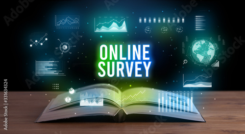Tableau sur toile ONLINE SURVEY inscription coming out from an open book, creative business concep
