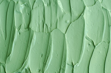 Sierkussen Pistachekleur Groene cosmetische klei textuur  © kazmulka
