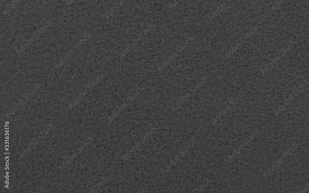 Background from black suede close up Background from black suede close up