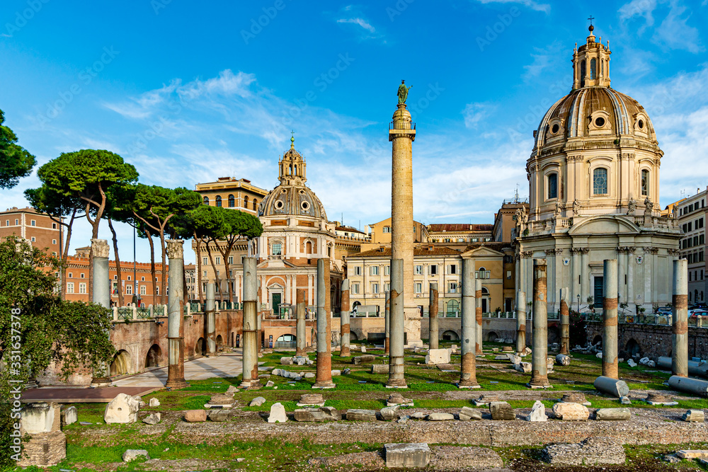 Excavated Forum of Cesari in Rome, Italy with Trajan's Column and the Church of Santa Maria di Loreto in background.