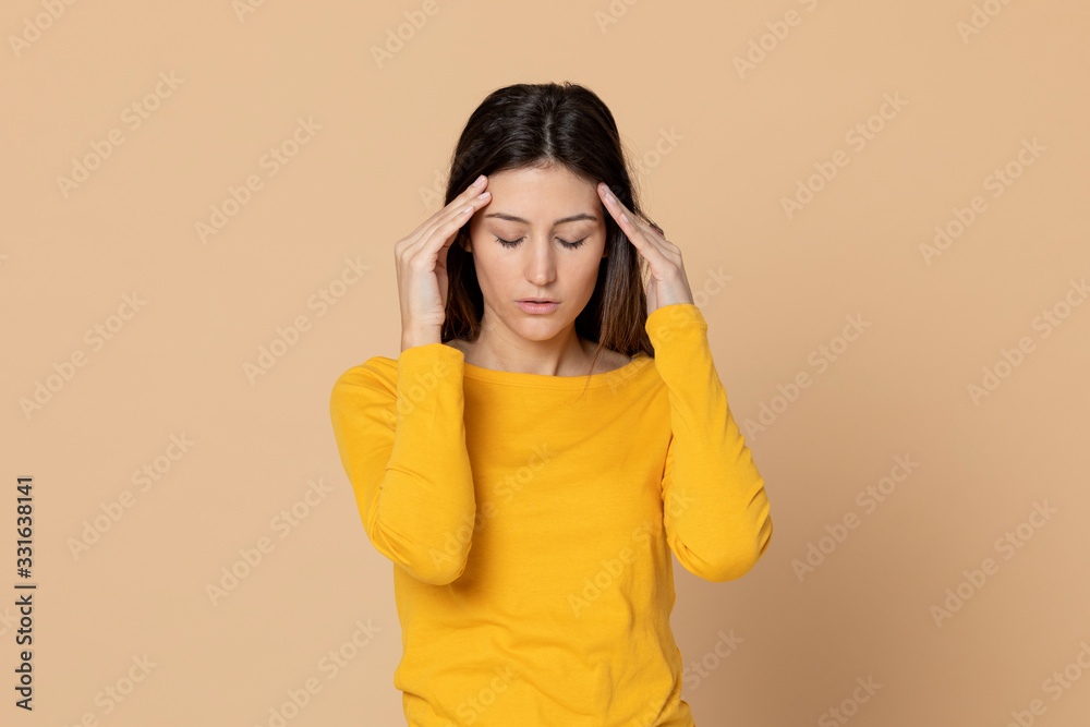 Attractive young girl wearing a yellow T-shirt Attractive young girl wearing a yellow T-shirt