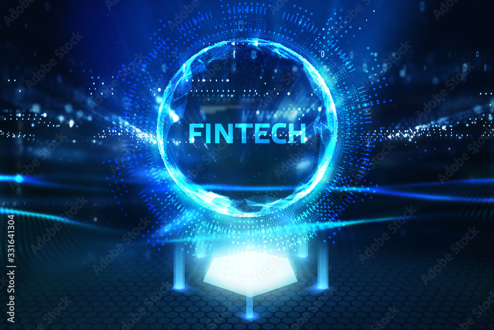 Fototapeta premium Fintech -financial technology concept.Young businessman select the icon Fintech on the virtual display.