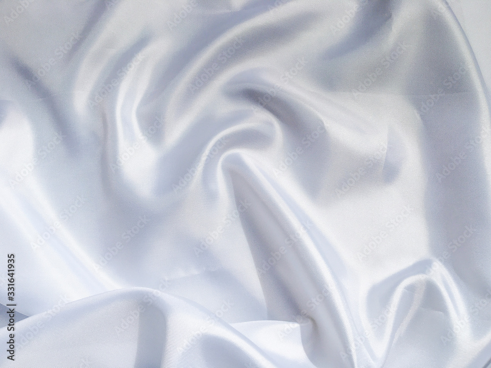 Obraz premium Solf white satin fabric texture background. use as wedding or aniversary day with copy space for design