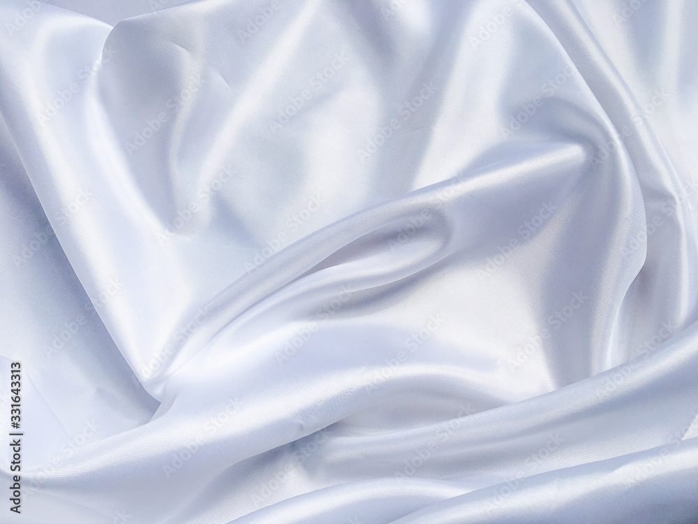 white crumpled fabric texture background. Silk curtain with fold waves for design