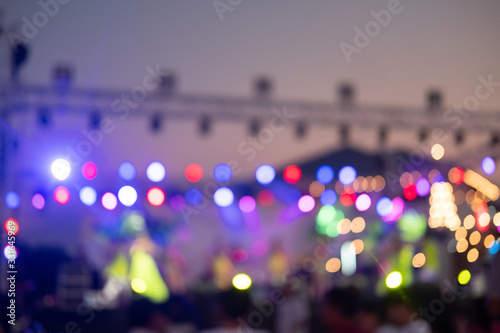 Abstract blur defocus background of neon decoration light on stage © Dontree