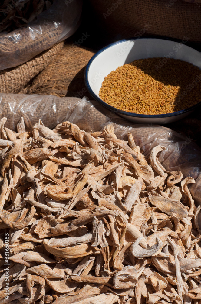 Dried mango and fenugreek for  sale at market