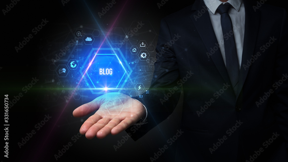 Man hand holding BLOG inscription, social media concept