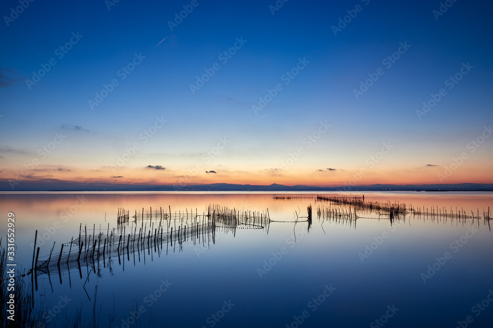 Winter sunset in the albufera de Valencia, Spain Winter sunset in the albufera de Valencia, Spain