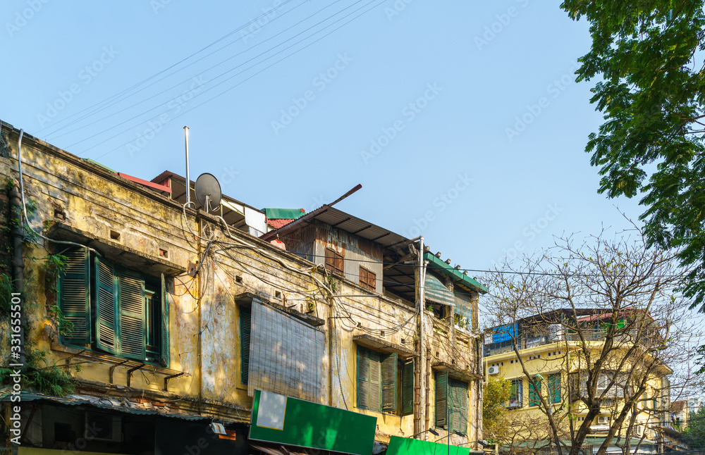 Old houses in Hanoi old quarter with blue sky