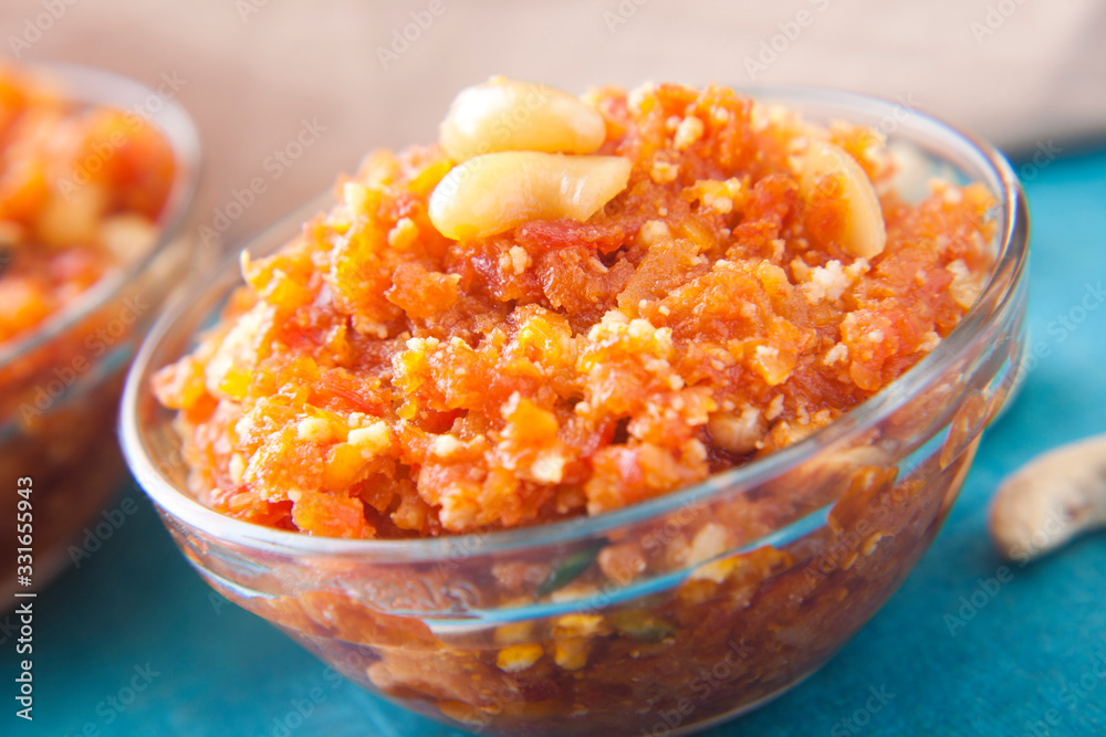 Gajar ka halwa in a bowl , indian sweets Gajar ka halwa in a bowl , indian sweets