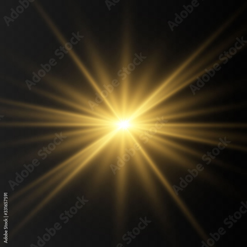 Set of Golden glowing lights effects isolated on transparent background. Flash of the sun with rays and searchlight. The glow effect. The star burst into brilliance.