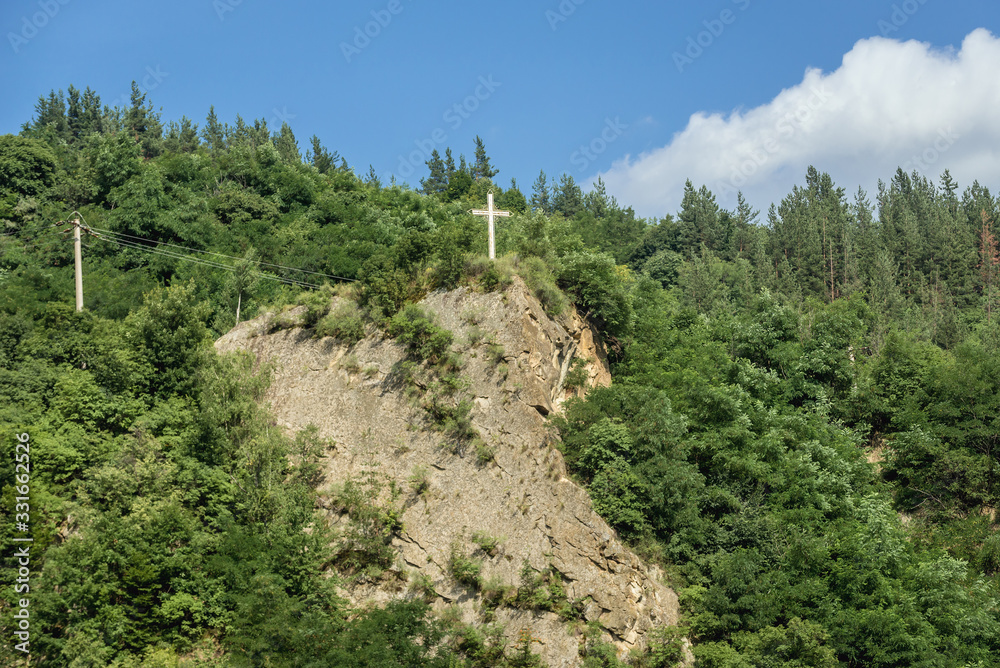 Cross on a rocky hill in Buzau district in Romania Cross on a rocky hill in Buzau district in Romania