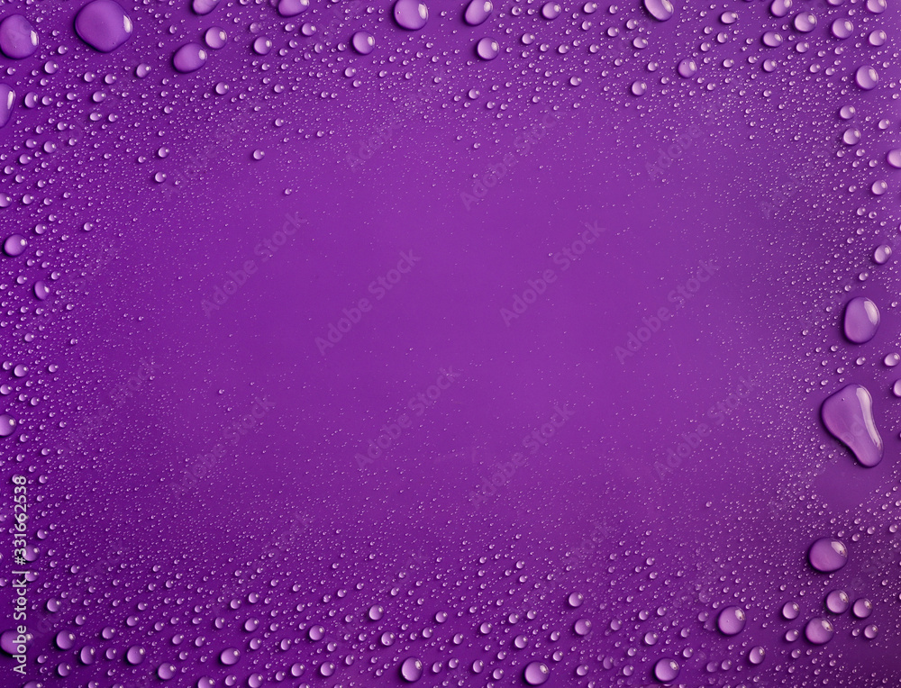 Frame of water drops on purple background Frame of water drops on purple background