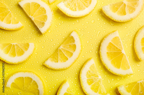 Lemon slices texture on yellow background