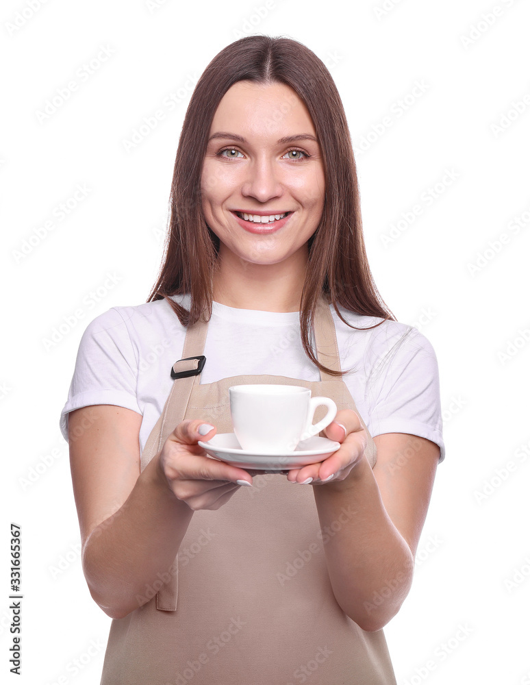 Young woman in apron with cup isolated on white background Young woman in apron with cup isolated on white background