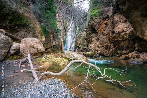 Waterfall in the gorge of Oreino near famous beach of Agia Fotia, Ierapetra, Crete, Greece. photo