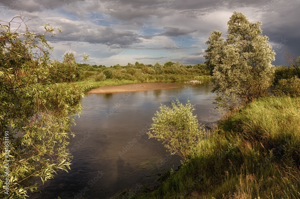 cloudy clouds over the river in summer cloudy clouds over the river in summer