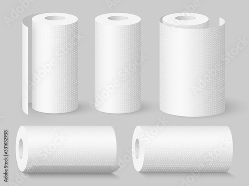 Set of realistic soft kitchen towel rolls. Isolated on grey background. Vector illustration.