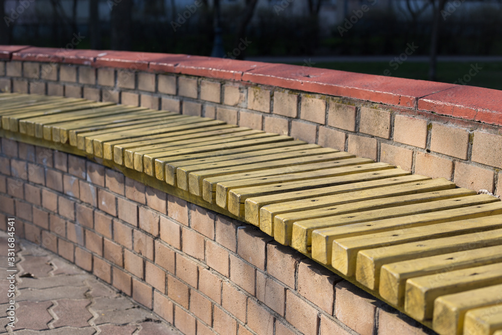 Obraz premium Outdoor furniture wooden bench in Kiev in Ukraine