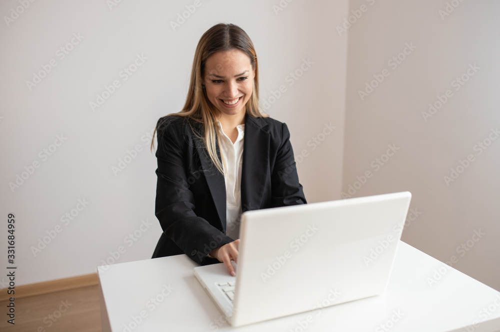 Young woman working in call center. Customer support woman in office Young woman working in call center. Customer support woman in office