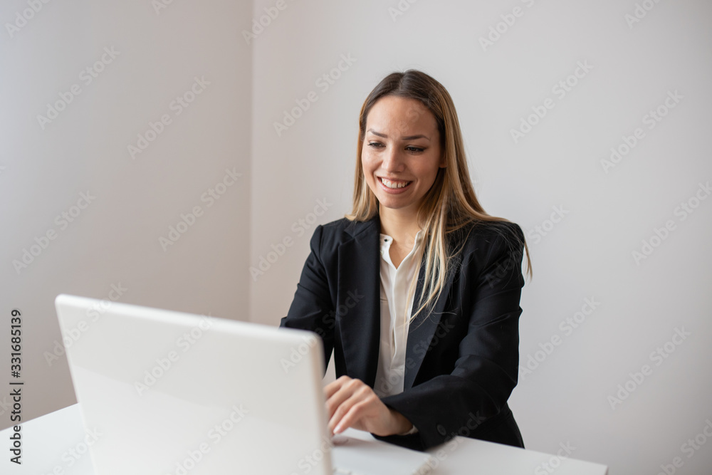Young woman working in call center. Customer support woman in office Young woman working in call center. Customer support woman in office