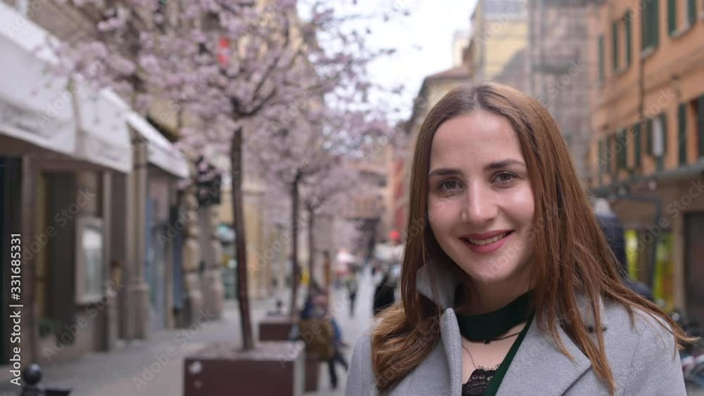 Girl on the street of the old city. Walking and hiking in old Italy. 