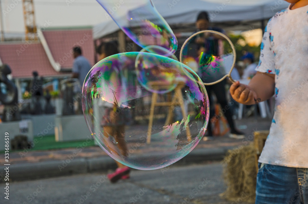 Beautiful air bubbles with child and making tool Beautiful air bubbles with child and making tool